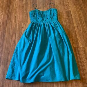 Ladies size 6, turquoise summer dress. Spaghetti strap, with embroidery cutouts.